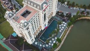 an overhead view of a large building with a parking lot at Westlake Hotel & Resort Vinh Phuc in Yen