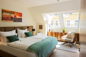 Postel nebo postele na pokoji v ubytování EST Residence Schönbrunn Vienna - Apartments
