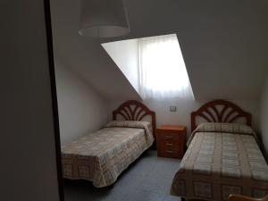 Posteľ alebo postele v izbe v ubytovaní Apartamento Telefónica Trece
