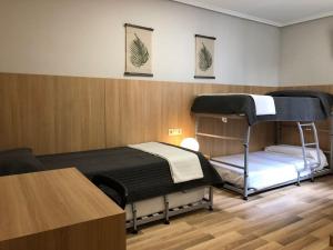Postel nebo postele na pokoji v ubytování Bearan Bar & Rooms