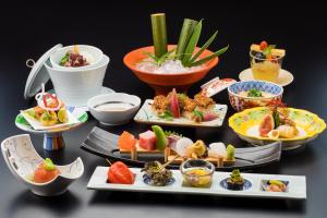 a group of plates of food on a table at Izu Mitohama Shotokan in Numazu +54 photos