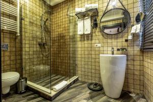 Koupelna v ubytování Hotel Adamo