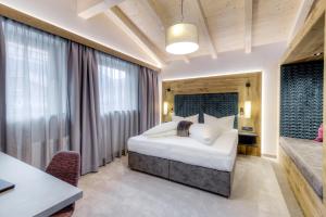 Voodi või voodid majutusasutuse Hotel Rose toas