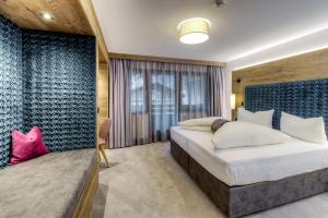 Voodi või voodid majutusasutuse Hotel Rose toas
