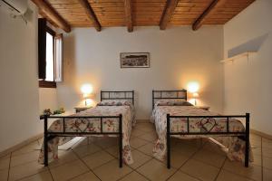 Posteľ alebo postele v izbe v ubytovaní Flat for family & friends in Cagliari’ town center