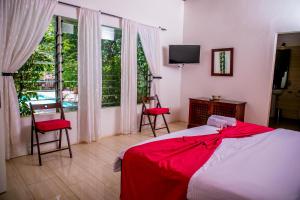 Fotografie z fotogalerie ubytování Hibiscus House Gambia v destinaci Brufut + 55 fotografií