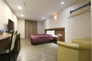 TV/trung tâm giải trí tại 鼎立安商務旅館 Dinglian Hotel