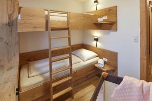 Letto o letti in una camera di Alpenhotel Ernberg