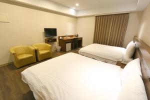 TV/trung tâm giải trí tại 鼎立安商務旅館 Dinglian Hotel