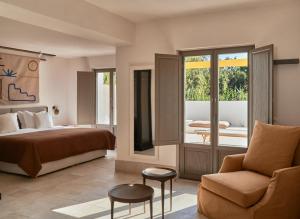 Ein Bett oder Betten in einem Zimmer der Unterkunft Parilio, a Member of Design Hotels