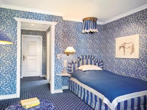 Posteľ alebo postele v izbe v ubytovaní Hotel Edelweiss