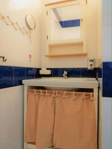 Ett badrum på Vitali Beach Houses