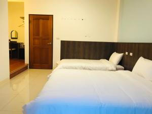 Letto o letti in una camera di Moo House