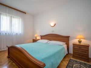 Posteľ alebo postele v izbe v ubytovaní Apartment Fuma-1 by Interhome