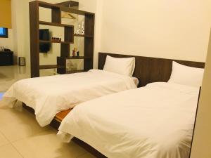 Letto o letti in una camera di Moo House