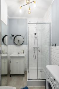 Kúpeľňa v ubytovaní Apartament Ogród Krasińskich