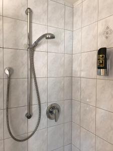 Een badkamer bij Poseidon Hotel