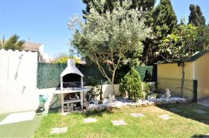 Vonkajšia záhrada v ubytovaní VILLA HUGO- Badia Gran- Llucmajor- Mallorca