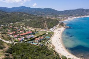 an aerial view of a beach and the ocean at De plata apartments in Sarti