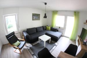 Posezení v ubytování Ferienwohnungen und Appartements - Haus Budinger