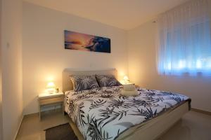 Letto o letti in una camera di LAMALU