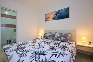 Letto o letti in una camera di LAMALU