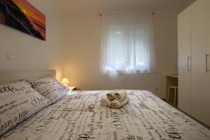 Letto o letti in una camera di LAMALU