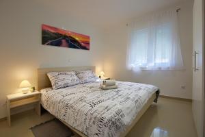Letto o letti in una camera di LAMALU