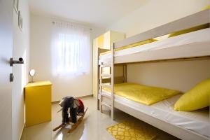 Letto o letti in una camera di LAMALU