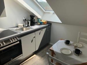 Küche/Küchenzeile in der Unterkunft Haus Grünewald Unsleben