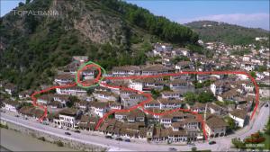 a map of a town with a red line at Guest House Panorama in Berat