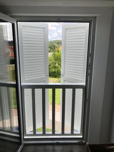 Ein Balkon oder eine Terrasse in der Unterkunft Haus Grünewald Unsleben