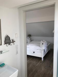 Ein Bett oder Betten in einem Zimmer der Unterkunft Haus Grünewald Unsleben