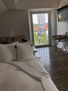 Ein Bett oder Betten in einem Zimmer der Unterkunft Haus Grünewald Unsleben