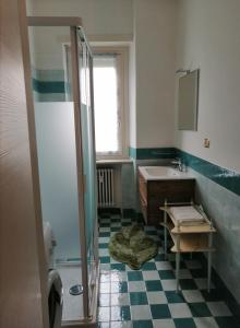 a bathroom with a shower and a sink at Casa Fresia in Turin