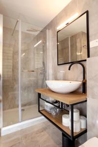 a bathroom with a sink and a shower at Villa Teuta in Trogir +54 photos
