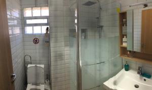 A bathroom at MAGO APARTMENTS