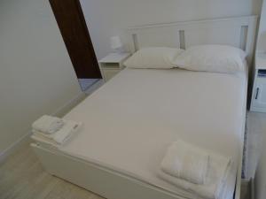Posteľ alebo postele v izbe v ubytovaní Job studio apartments