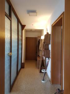 a hallway of a room with a door and a room with a room at Ferienwohnung mit eigenem Pool und finnischer Sauna in Witten in Witten