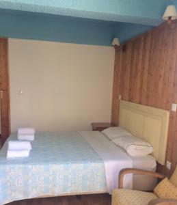 Een bed of bedden in een kamer bij Casinhas do Ribeiro
