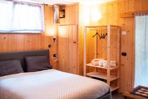 Baita Carnale, Montagna in Valtellina tesisinde bir odada yatak veya yataklar