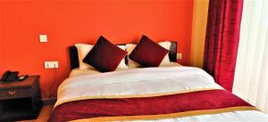 Postel nebo postele na pokoji v ubytování Hotel Nagarkot Inn