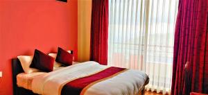 Postel nebo postele na pokoji v ubytování Hotel Nagarkot Inn