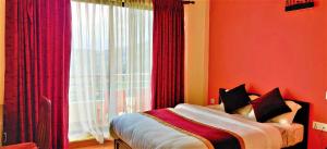 Postel nebo postele na pokoji v ubytování Hotel Nagarkot Inn