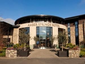 a building with a sign that reads ranger springs hotel at Amber Springs Hotel in Gorey