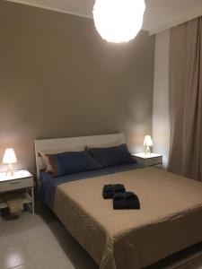 A bed or beds in a room at Casa vacanze Circle House Santa Filomena