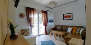A seating area at MAGO APARTMENTS