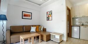 A kitchen or kitchenette at MAGO APARTMENTS