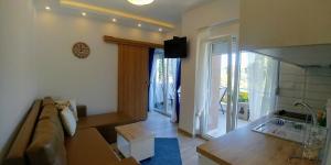 A kitchen or kitchenette at MAGO APARTMENTS
