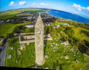 an aerial view of a tall building on a green field at No 12 B&B in Dungarvan